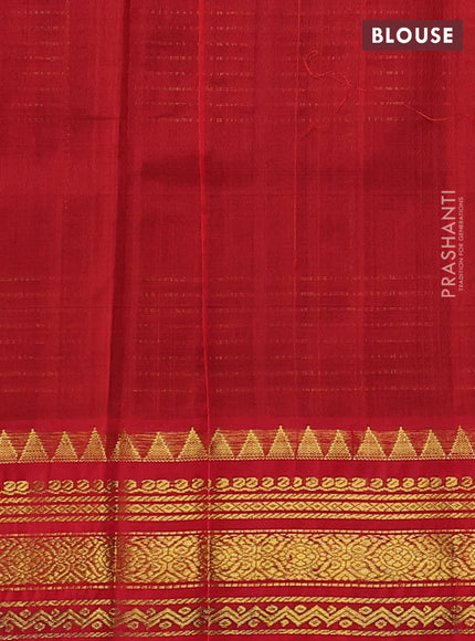 Silk cotton saree blue and red with allover zari checked pattern and temple design zari woven border