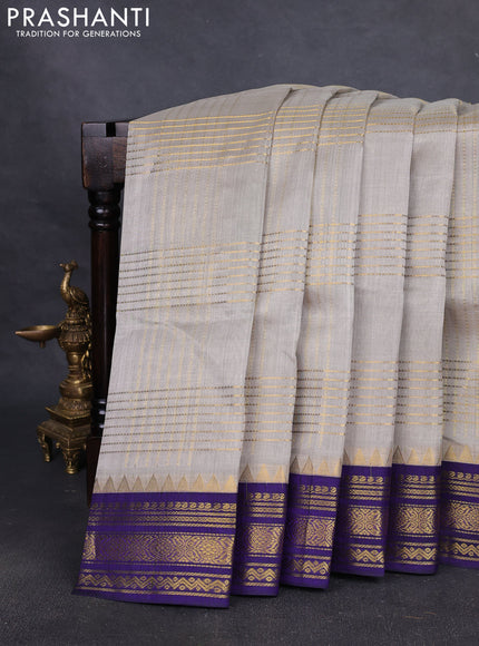 Silk cotton saree grey and blue with allover zari checked pattern and temple design zari woven border