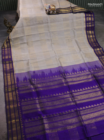 Silk cotton saree grey and blue with allover zari checked pattern and temple design zari woven border