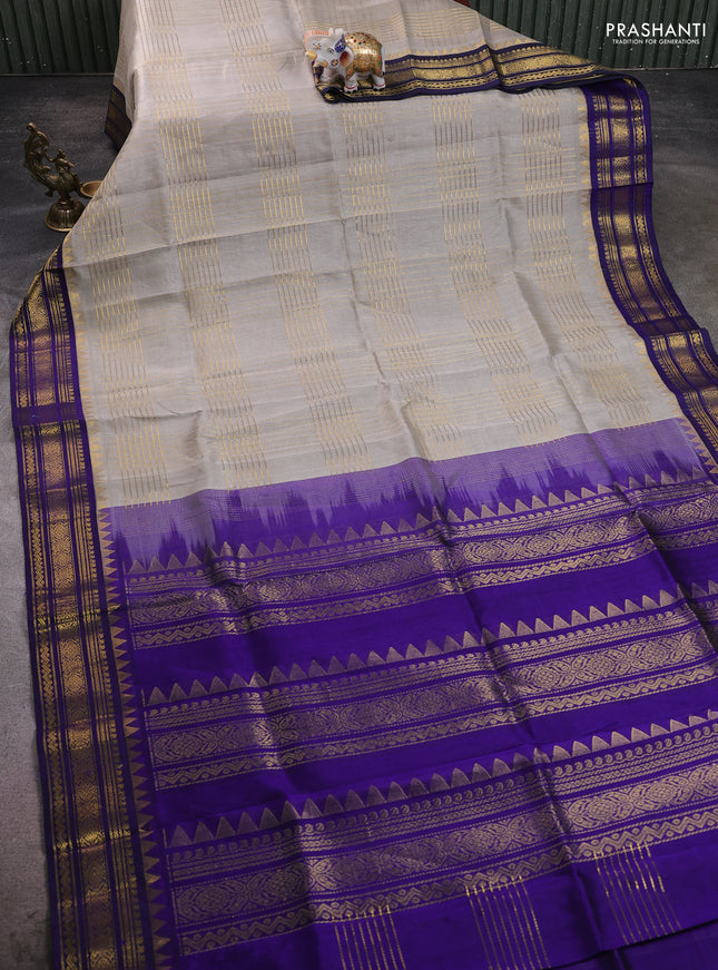 Silk cotton saree grey and blue with allover zari checked pattern and temple design zari woven border