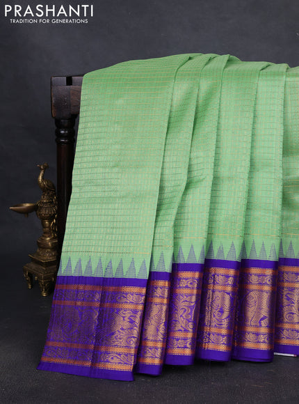 Kuppadam silk cotton saree teal green and blue with allover zari checks & lakshadeepam weaves and zari woven korvai border