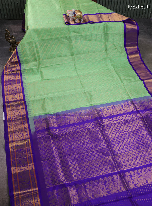 Kuppadam silk cotton saree teal green and blue with allover zari checks & lakshadeepam weaves and zari woven korvai border
