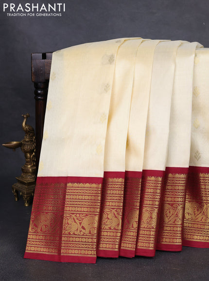 Silk cotton saree cream and maroon with zari woven buttas and zari woven korvai border