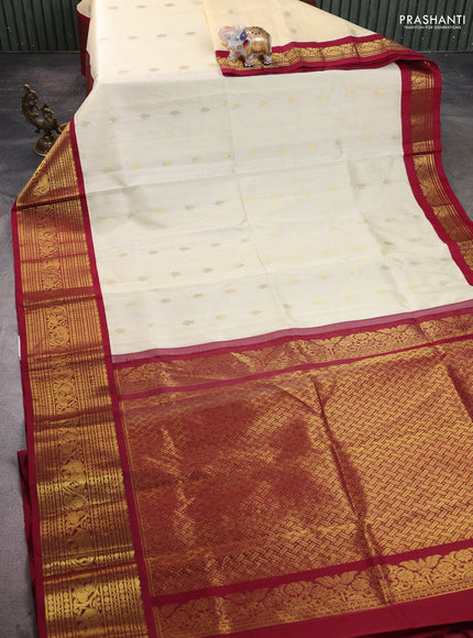 Silk cotton saree cream and maroon with zari woven buttas and zari woven korvai border