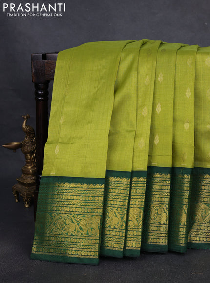 Silk cotton saree light green and green with zari woven buttas and zari woven korvai border