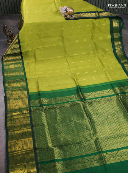 Silk cotton saree light green and green with zari woven buttas and zari woven korvai border