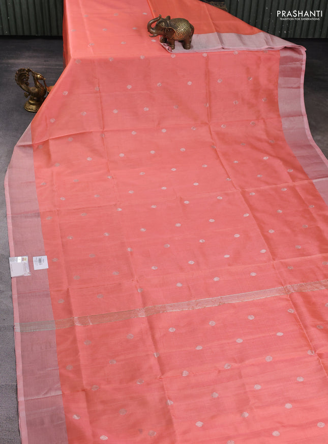 Pure uppada silk saree pale orange with silver zari woven coin buttas and silver zari woven border