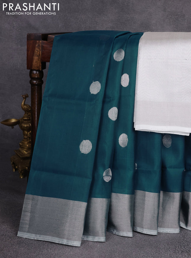 Pure uppada silk saree peacock blue with silver zari woven coin buttas and silver zari woven border