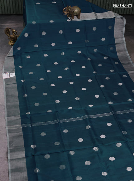 Pure uppada silk saree peacock blue with silver zari woven coin buttas and silver zari woven border