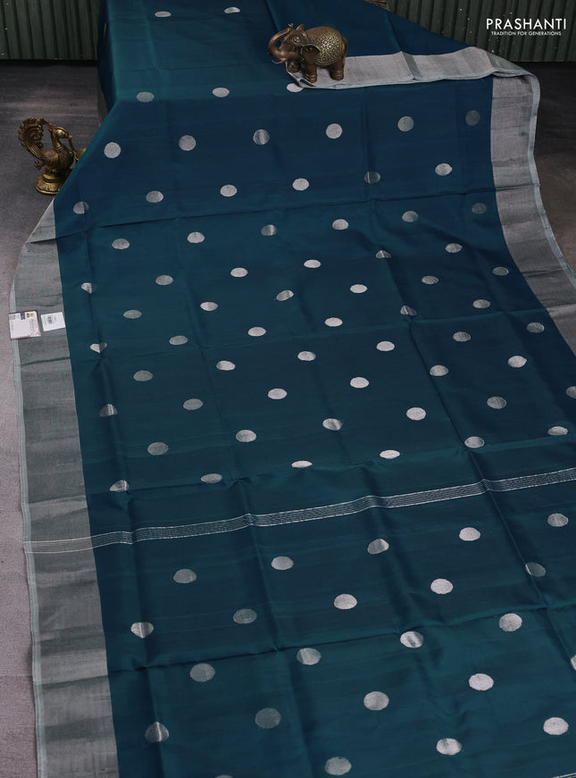 Pure uppada silk saree peacock blue with silver zari woven coin buttas and silver zari woven border