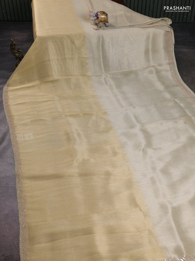 Tissue silk saree sandal with plain body and sequin work border