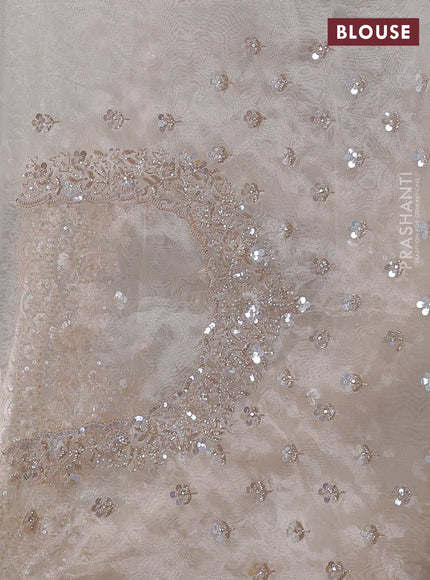 Organza silk saree beige with allover sequins embroidery