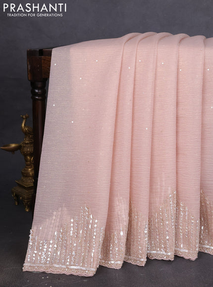 Crush tissue saree mild peach with allover sequins embroidery