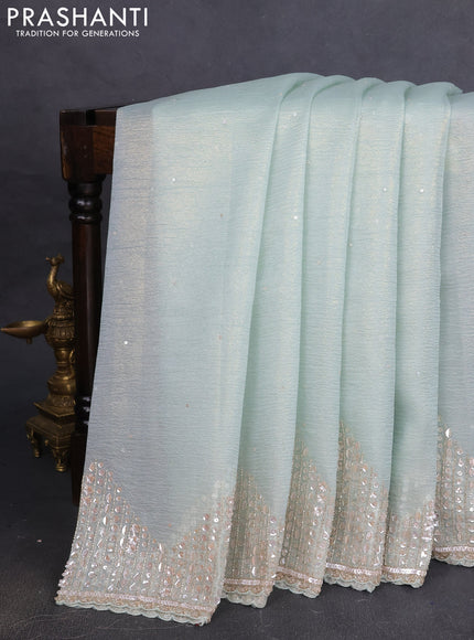 Crush tissue saree pastel green with allover sequins embroidery