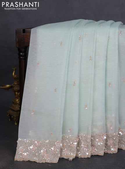 Crush tissue saree pastel green with allover sequins embroidery