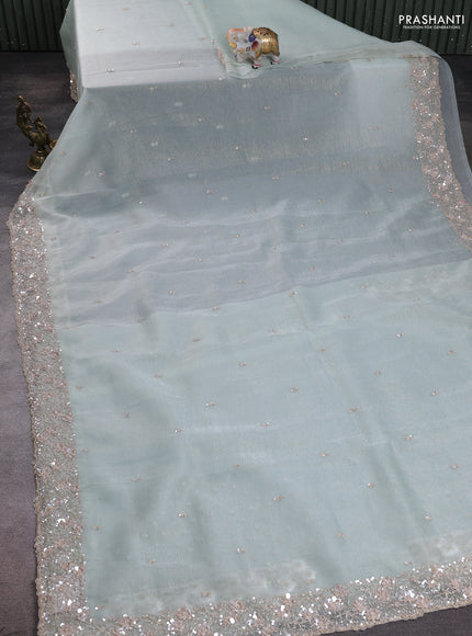 Crush tissue saree pastel green with allover sequins embroidery