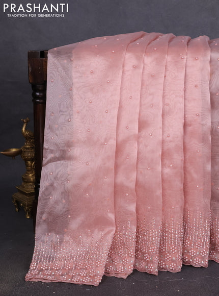 Organza silk saree peach shade with allover stone work