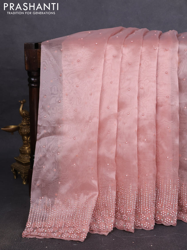 Organza silk saree peach shade with allover stone work
