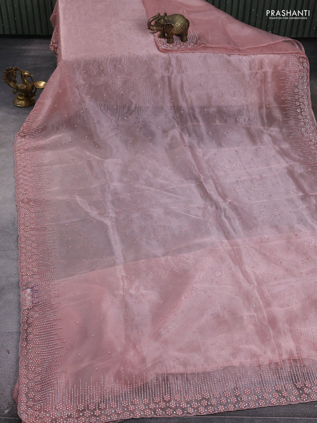 Organza silk saree peach shade with allover stone work