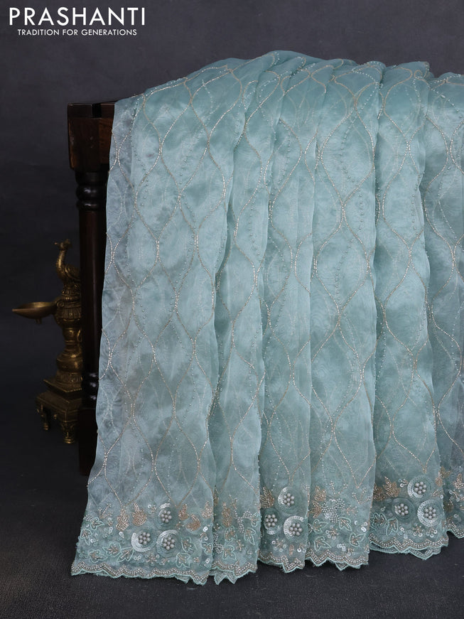 Organza silk saree teal shade with allover beads & sequin work