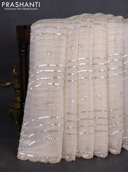 Crush tissue saree cream with allover sequins embroidery