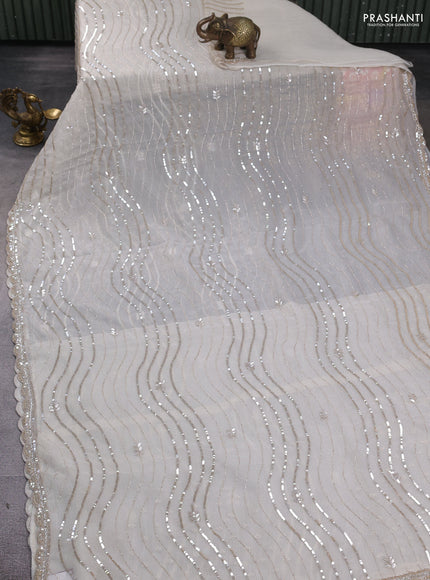 Crush tissue saree cream with allover sequins embroidery