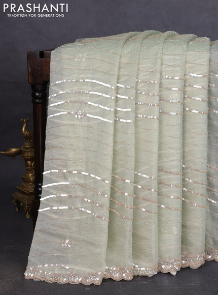 Crush tissue saree pista green with allover beads & sequin work