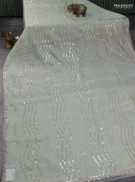 Crush tissue saree pista green with allover beads & sequin work