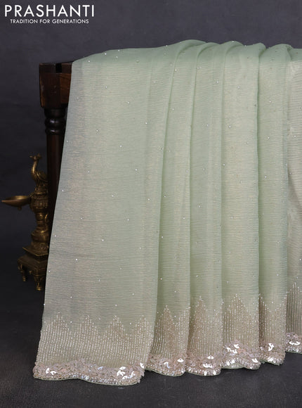 Crush tissue saree pista green with allover sequins embroidery