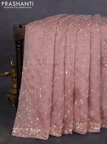 Organza silk saree peach shade with allover sequins embroidery