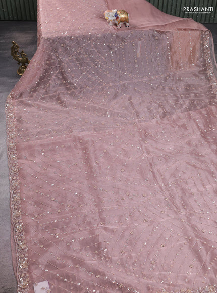 Organza silk saree peach shade with allover sequins embroidery