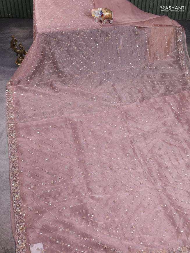Organza silk saree peach shade with allover sequins embroidery