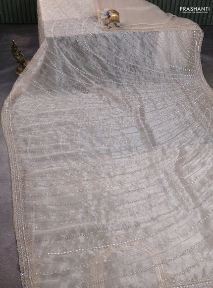 Organza silk saree beige with allover sequins embroidery