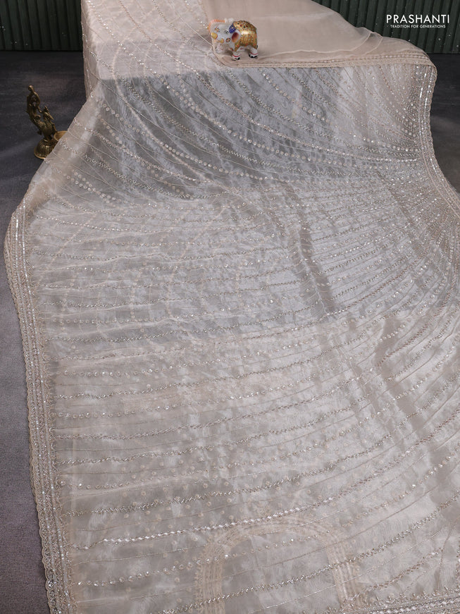 Organza silk saree beige with allover sequins embroidery
