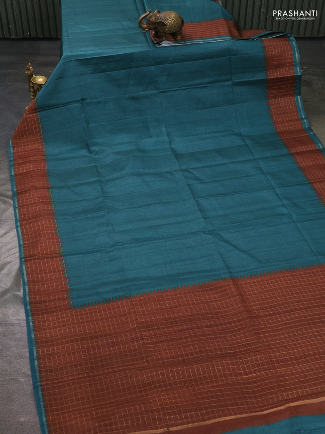 Semi tussar saree peacock green and brown with plain body and temple design zari checked border