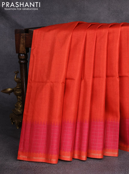 Semi tussar saree orange and pink with plain body and temple design zari checked border