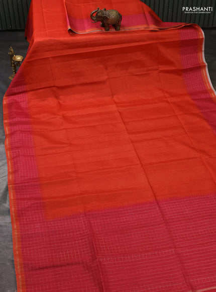 Semi tussar saree orange and pink with plain body and temple design zari checked border