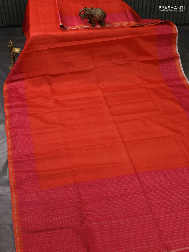 Semi tussar saree orange and pink with plain body and temple design zari checked border