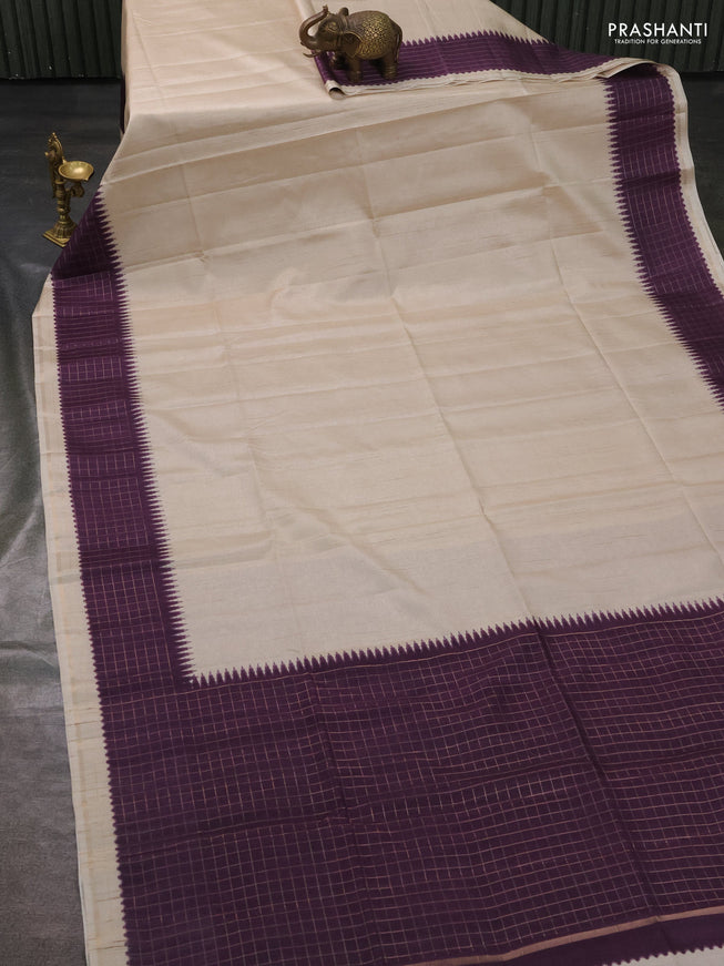 Semi tussar saree cream and wine with plain body and temple design zari checked border