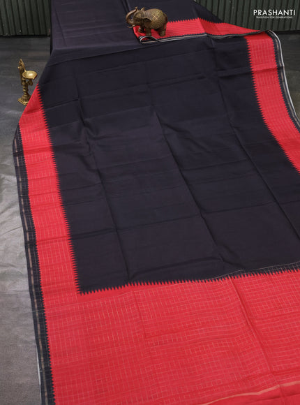Semi tussar saree black and red with plain body and temple design zari checked border