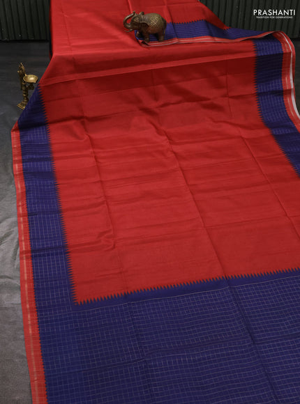 Semi tussar saree red and blue with plain body and temple design zari checked border