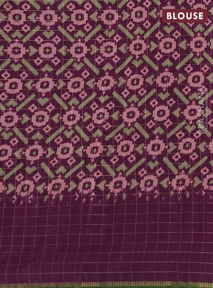 Semi tussar saree green and purple with plain body and temple design zari checked border