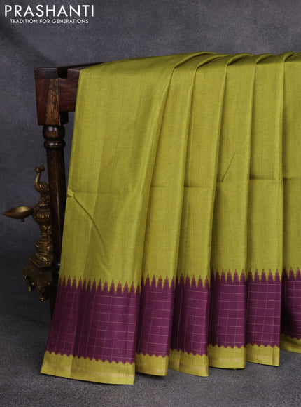 Semi tussar saree light green and purple with plain body and temple design zari checked border