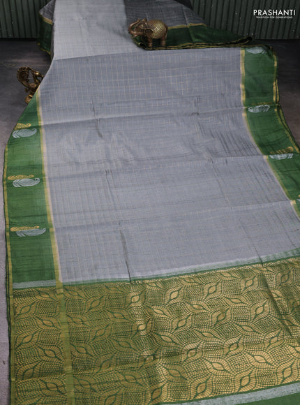 Pure dupion silk saree grey and sap green with allover zari checked pattern and zari woven butta border