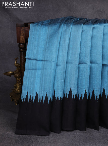 Pure dupion silk saree light blue and black with plain body and temple woven border