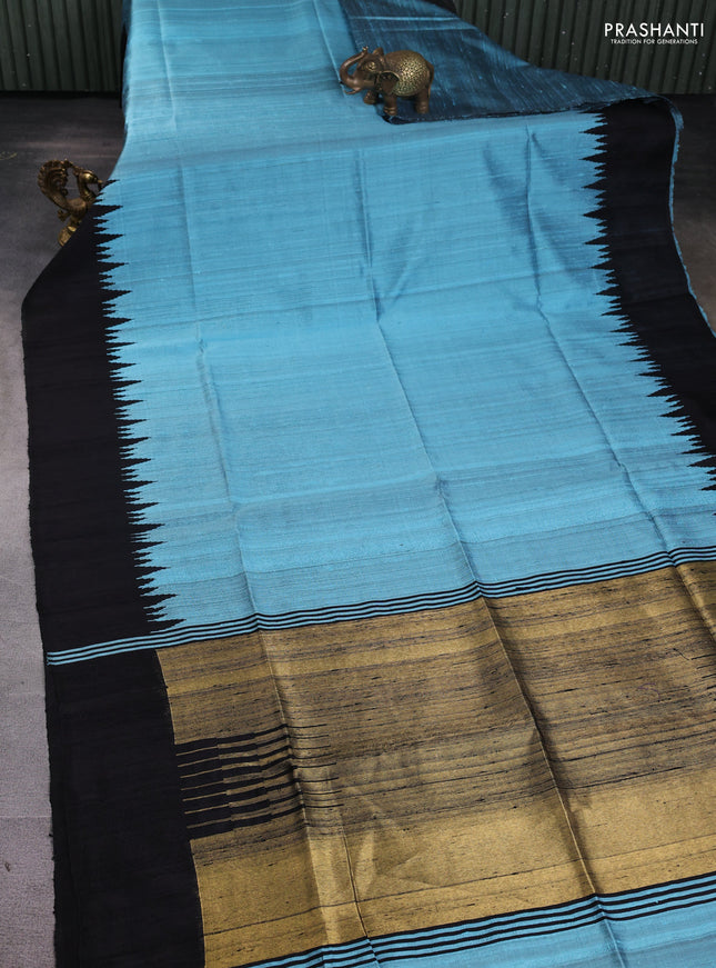 Pure dupion silk saree light blue and black with plain body and temple woven border