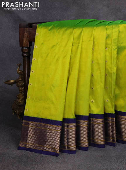 Pure paithani silk saree fluorescent green and blue with zari woven floral buttas and zari woven border