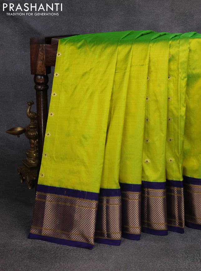 Pure paithani silk saree fluorescent green and blue with zari woven floral buttas and zari woven border