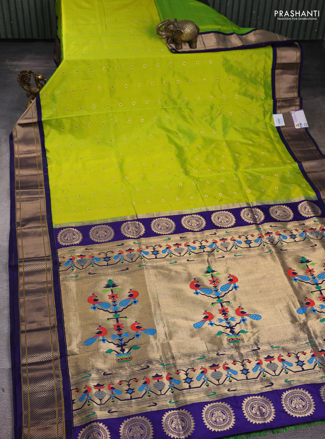 Pure paithani silk saree fluorescent green and blue with zari woven floral buttas and zari woven border