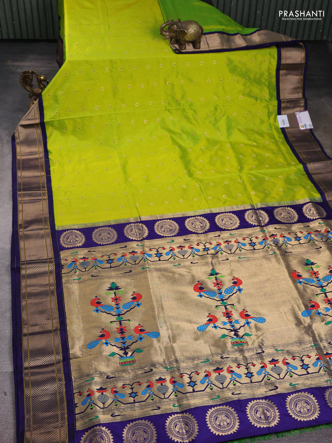 Pure paithani silk saree fluorescent green and blue with zari woven floral buttas and zari woven border